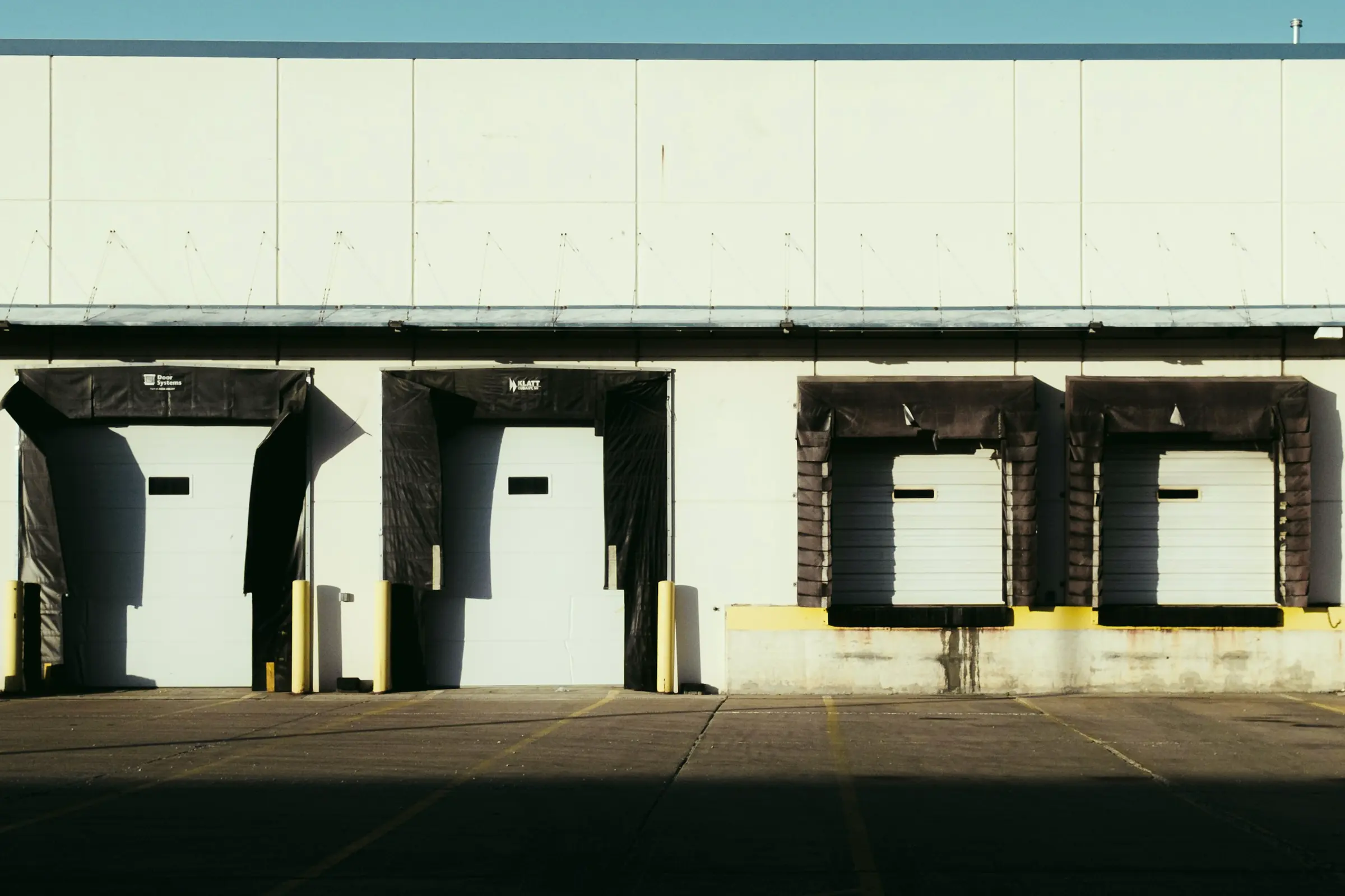 A row of warehouse loading dock doors